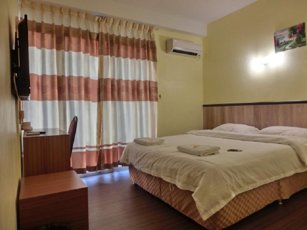 The Garden Inn Miri Δωμάτιο φωτογραφία